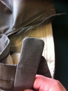 Trouser extension. Compare this factory made one to my tailored one ! Hello ! Someone tell the factory this extension should be square !