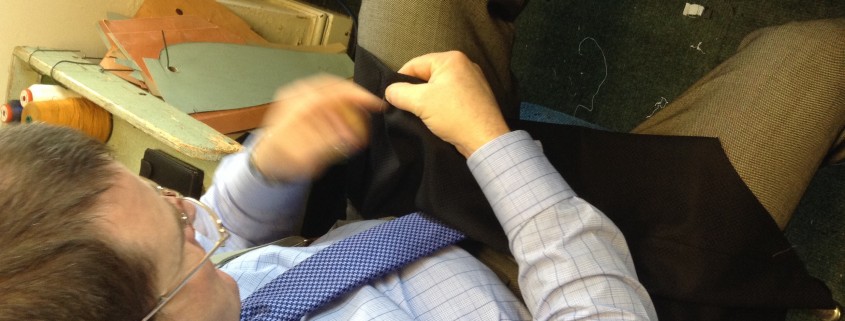 Hand made button holes. Me sat making hand button holes. 